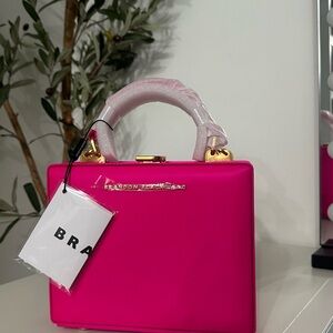 Brandon Blackwood bright fuchsia w/ gold hardware standard Kendrick trunk